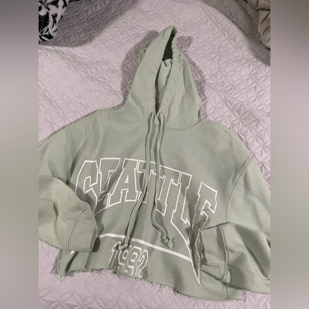 Cropped light green Seattle sweater